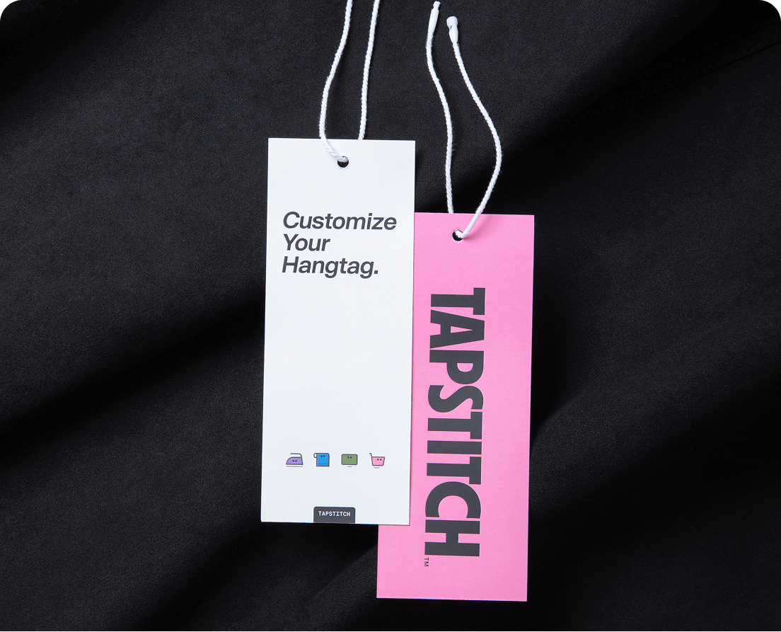 Custom fashion hangtags with Tapstitch branding for apparel packaging and brand identity