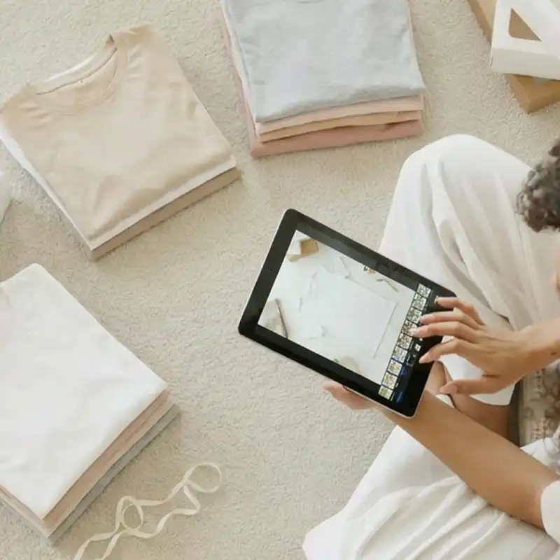 Seller shooting product images for his online shop