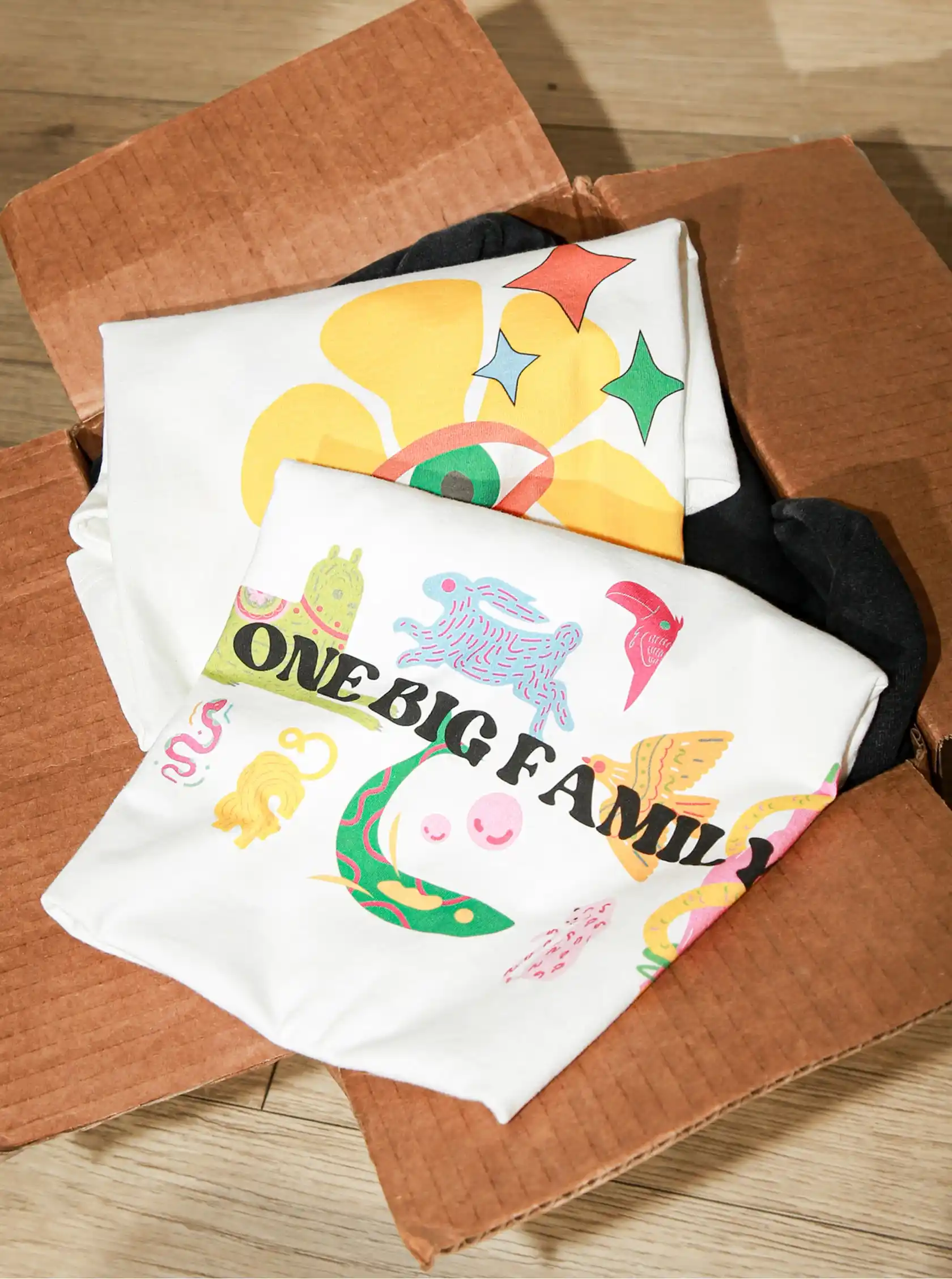 The courier box contains the custom apparel that Tapstitch has quickly made for you. They are ready to be dispatched to you.