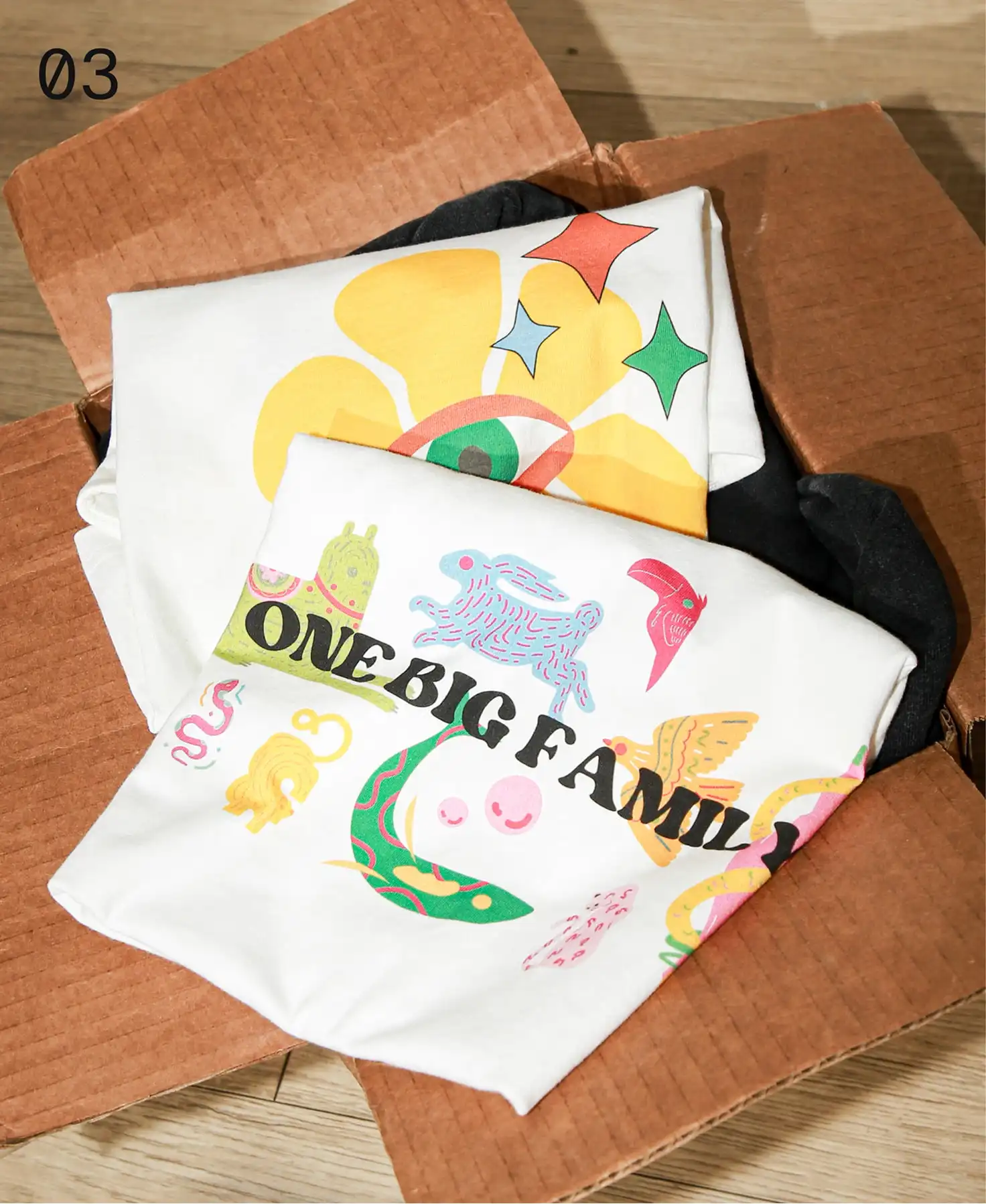 A box contains custom clothes