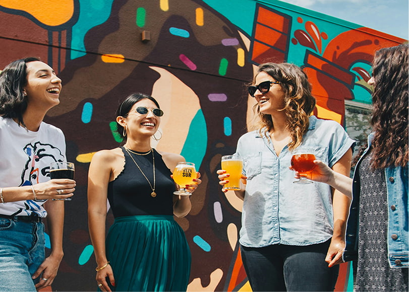 Four fashionable women were discussing the Etsy trending