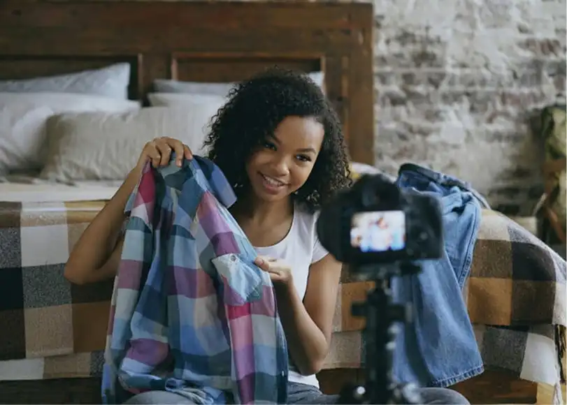 woman live streaming selling print on demand clothing