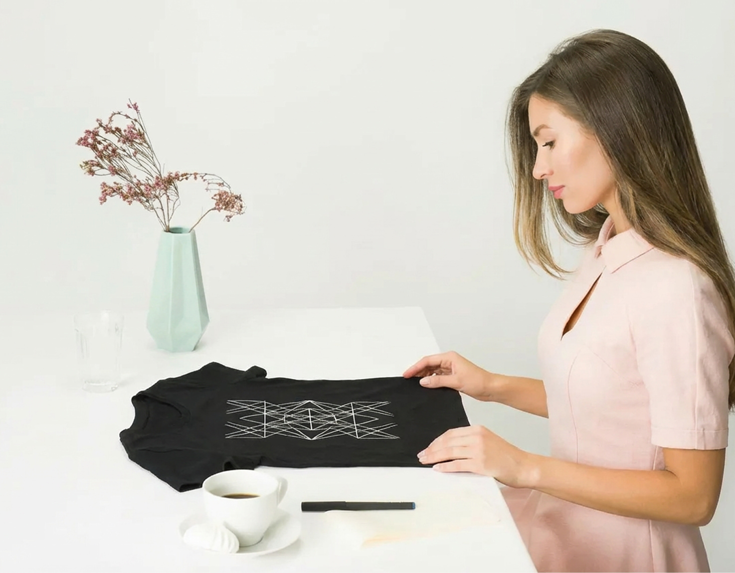 creator reviewing custom t-shirt designs